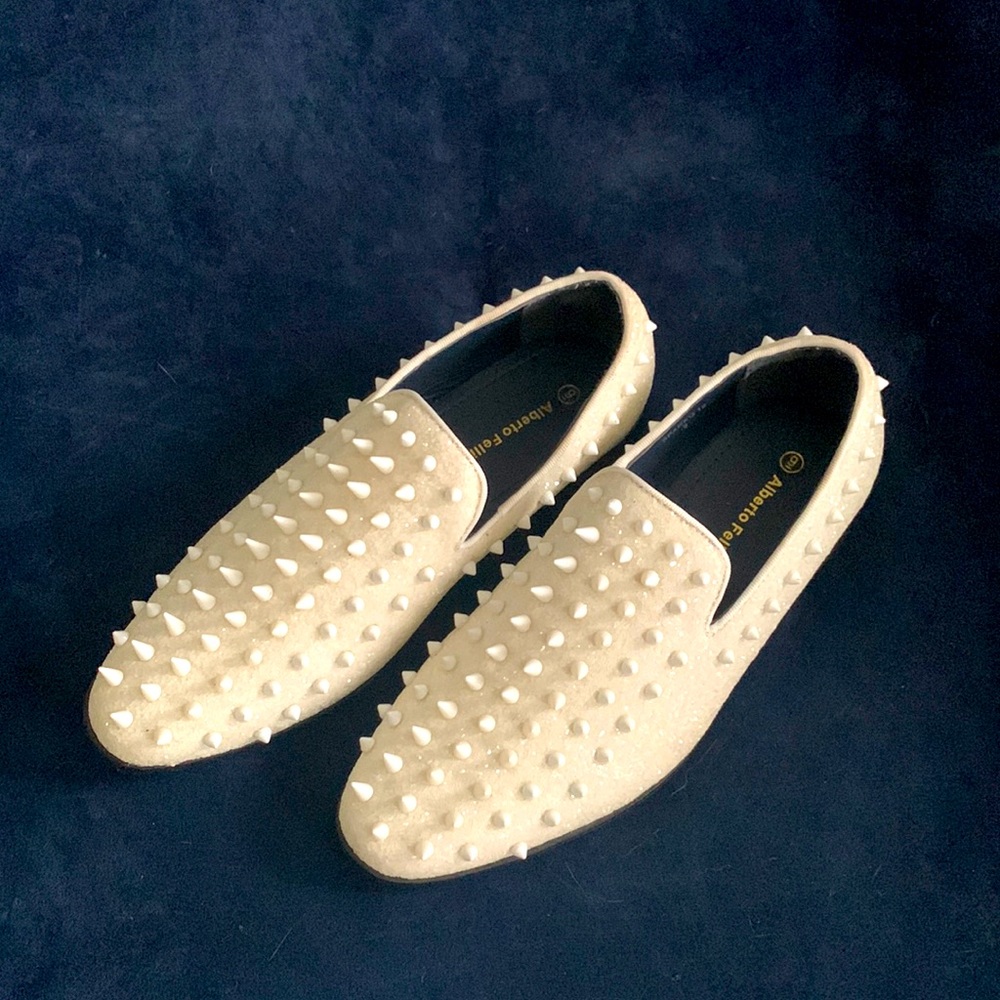 Who needs some white spikey shoes?